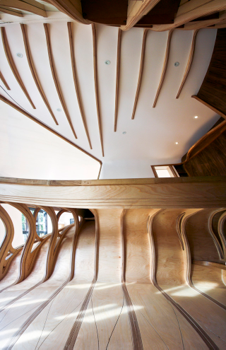 Illustration for article titled Bendy Wooden Room Snaps Together Like Tetris, Takes Over House